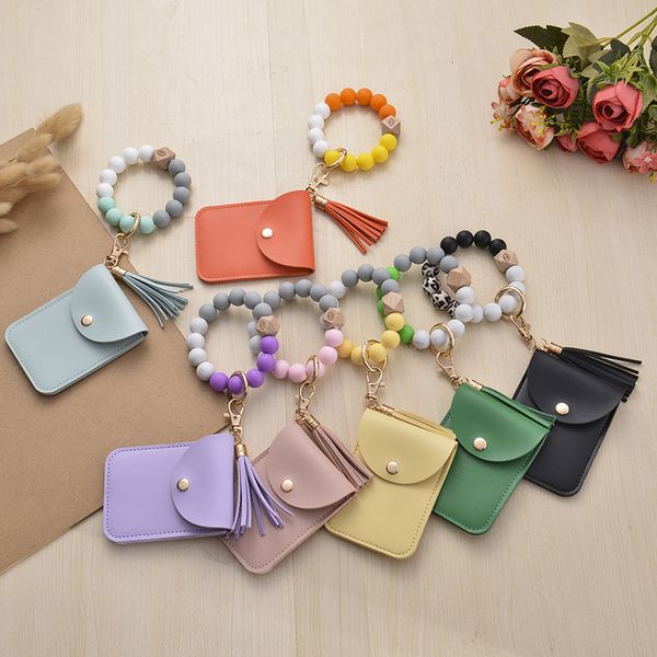 factory wholesale new silicone wooden bead bag key ring bracelet id card cover bracelet party gift
factory wholesale new silicone wooden bead bag key ring bracelet id card cover bracelet party gift