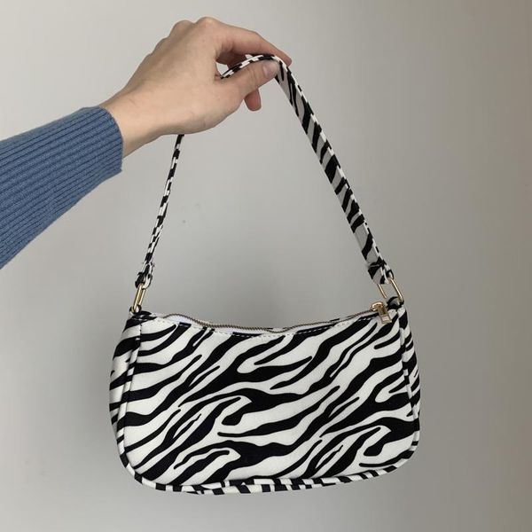 zebra print mini bag women 2021 summer adjustable handle black white contrast color packs fashion simple chic handbags waist bags
zebra print mini bag women 2021 summer adjustable handle black white contrast color packs fashion simple chic handbags waist bags