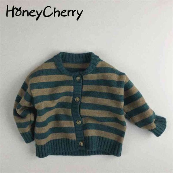 autumn and winter toddler sweater children's pullover single-breasted blue round neck striped cotton cardigan 210702
autumn and winter toddler sweater children's pullover single-breasted blue round neck striped cotton cardigan 210702
