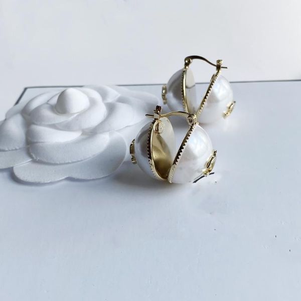 hoop & huggie pearl brand style earrings, please contact shoppers for more pictures, Golden;silver
hoop & huggie pearl brand style earrings, please contact shoppers for more pictures, Golden;silver