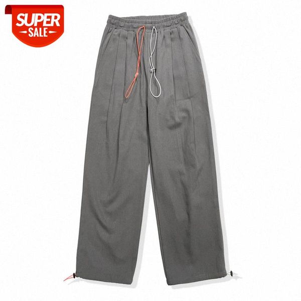 net red/s japanese retro simple solid color tooling two-color drawstring street loose woven pants men #km09, Blue
net red/s japanese retro simple solid color tooling two-color drawstring street loose woven pants men #km09, Blue