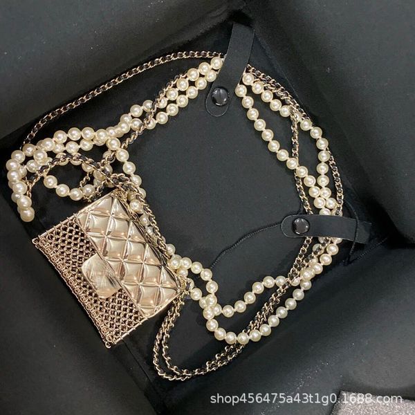 star same 2021 small fragrance gold chain pearl necklace female box hollow waist bag letter, Silver
star same 2021 small fragrance gold chain pearl necklace female box hollow waist bag letter, Silver