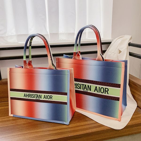women's 2021 new net red fashion canvas color portable tote bag temperament printing large capacity shoulder bag
women's 2021 new net red fashion canvas color portable tote bag temperament printing large capacity shoulder bag