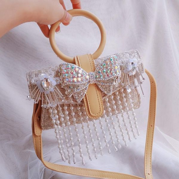 fashion heavy industry rhinestone tassel bowknot portable messenger shoulder chain female bag waist bags
fashion heavy industry rhinestone tassel bowknot portable messenger shoulder chain female bag waist bags
