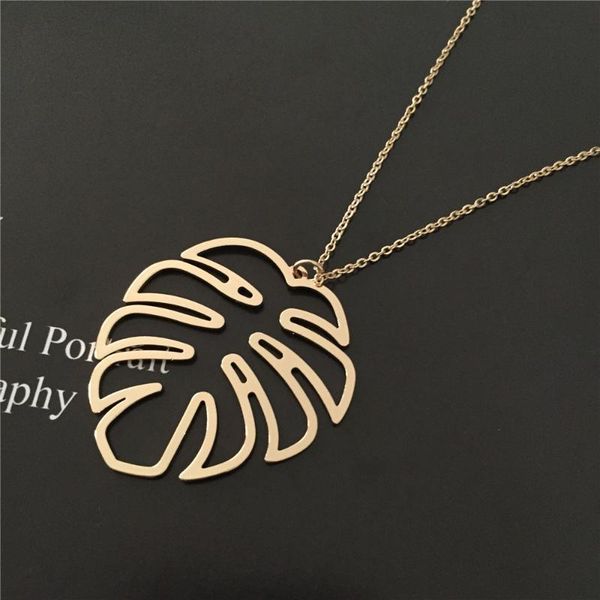 pendant necklaces fashion gold color hollow carving banana's leaf with linked chain necklace for lady casual wearring, Silver
pendant necklaces fashion gold color hollow carving banana's leaf with linked chain necklace for lady casual wearring, Silver