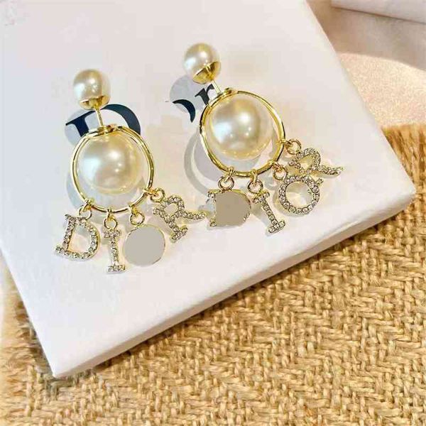 70% off outlet online front and back pearl hanging letter diamond fashion style trendy earrings, Golden
70% off outlet online front and back pearl hanging letter diamond fashion style trendy earrings, Golden