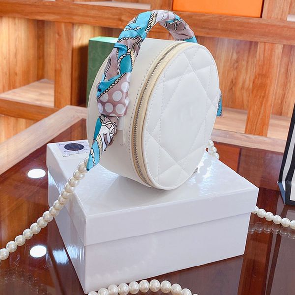 women luxury designers crossbody cosmetic bags fashion shoulder bag leather artwork circular handbag pearl shoulder strap
women luxury designers crossbody cosmetic bags fashion shoulder bag leather artwork circular handbag pearl shoulder strap