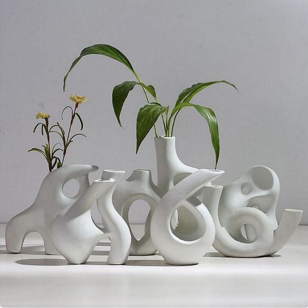 abstract art ceramic vase nordic minimalist decoration flower arrangement creative living room tv cabinet deskdecoration
abstract art ceramic vase nordic minimalist decoration flower arrangement creative living room tv cabinet deskdecoration