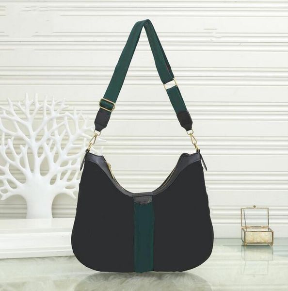 2021 designers women's fashion handbag casual armpit shoulder bag classic graffiti design large capacity with dust
2021 designers women's fashion handbag casual armpit shoulder bag classic graffiti design large capacity with dust