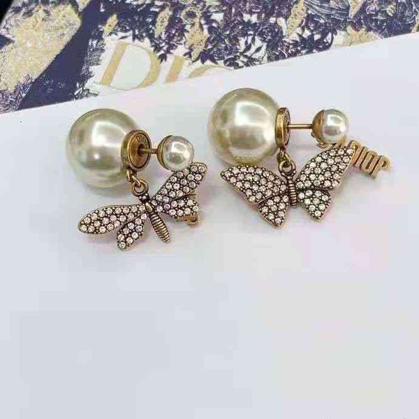 fire dijia d earrings fashion jewelry luxury women ao designer family bee asymmetric brass high version, Red;brown
fire dijia d earrings fashion jewelry luxury women ao designer family bee asymmetric brass high version, Red;brown