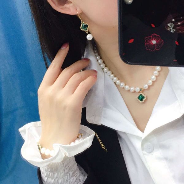 mother's day gift green clover freshwater set white pearl necklace bracelet ear hook female, Black
mother's day gift green clover freshwater set white pearl necklace bracelet ear hook female, Black