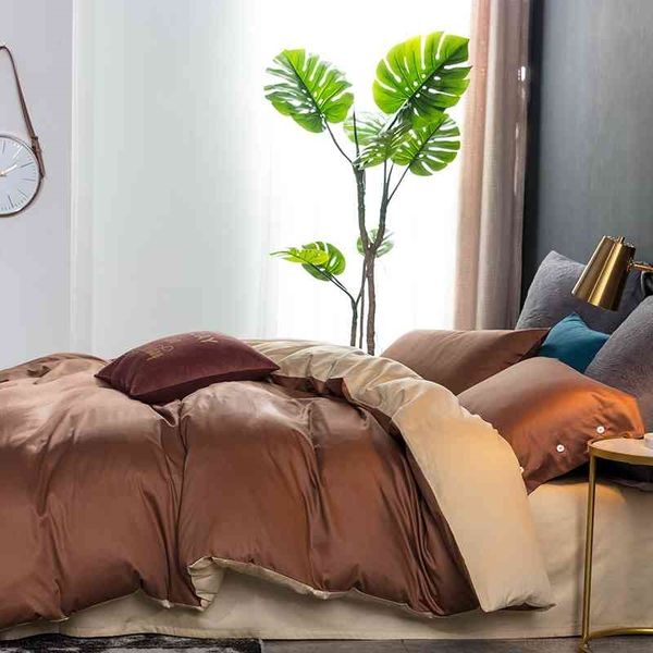 brown golden 2sides reversible comforter with button silky soft egyptian cotton bedding set duvet cover fitted bed sheet
brown golden 2sides reversible comforter with button silky soft egyptian cotton bedding set duvet cover fitted bed sheet