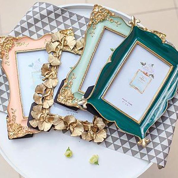 nordic resin po frame picture holder gift home decoration european retro creative crafts props frames
nordic resin po frame picture holder gift home decoration european retro creative crafts props frames