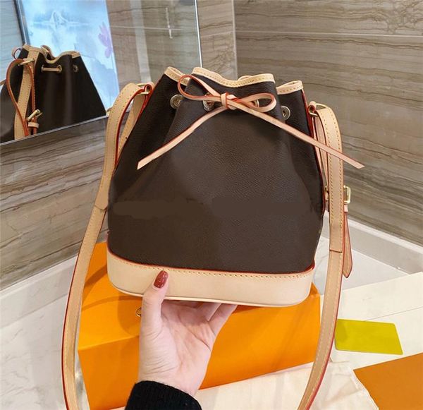 luxury sturdy stylish bucket bag coated canvas iconic shape drawstring closure women adjustable leather strap crossbody mini shoulder bags
luxury sturdy stylish bucket bag coated canvas iconic shape drawstring closure women adjustable leather strap crossbody mini shoulder bags