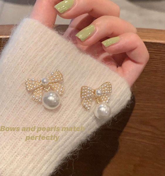 pearl bow earrings for women, Black
pearl bow earrings for women, Black