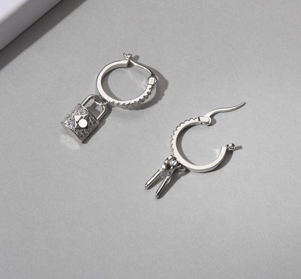 european and american asymmetric key lock dangle & chandelier fashion simple wild big earrings female fast delivery, Silver
european and american asymmetric key lock dangle & chandelier fashion simple wild big earrings female fast delivery, Silver