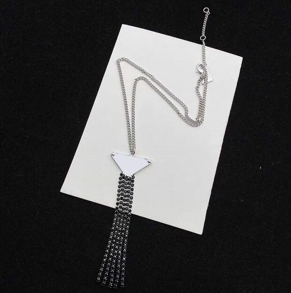 women triangle tassel silver chain pendant necklaces link fashion letter sweater chain necklace gift hip hop jewelry
women triangle tassel silver chain pendant necklaces link fashion letter sweater chain necklace gift hip hop jewelry