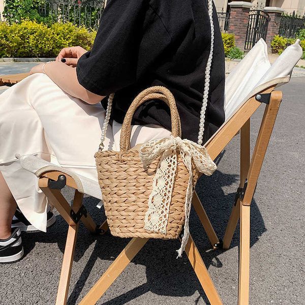 summer 2022net female red pearl new fashion straw bag portable bucket messenger bag
summer 2022net female red pearl new fashion straw bag portable bucket messenger bag