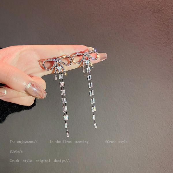925 silver needle diamond bowknot zircon tassel simple fashion net red temperament cold wind earrings
925 silver needle diamond bowknot zircon tassel simple fashion net red temperament cold wind earrings