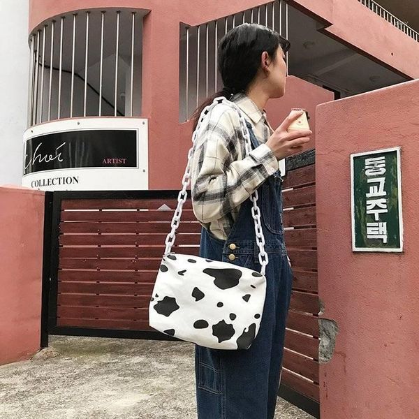 evening bags canvas cow messenger bag 2021 korean student resin round buckle chain shoulder handbag1
evening bags canvas cow messenger bag 2021 korean student resin round buckle chain shoulder handbag1