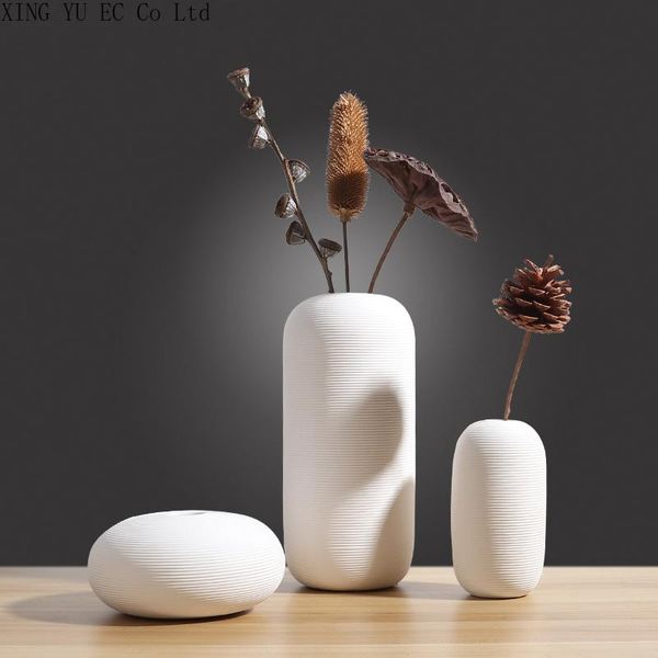 simple white ceramic vase decoration chinese flower arrangement dried accessories living room coffee table vases
simple white ceramic vase decoration chinese flower arrangement dried accessories living room coffee table vases