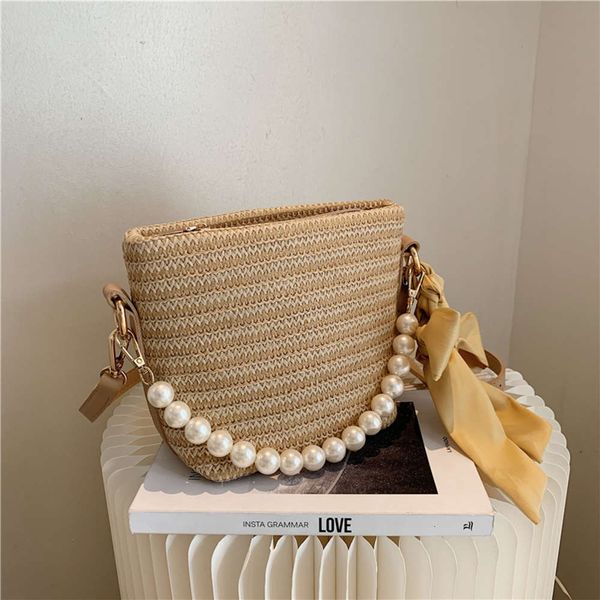 pearl portable straw bag 2021 korean fashion women's bucket simple bow versatile msenger
pearl portable straw bag 2021 korean fashion women's bucket simple bow versatile msenger