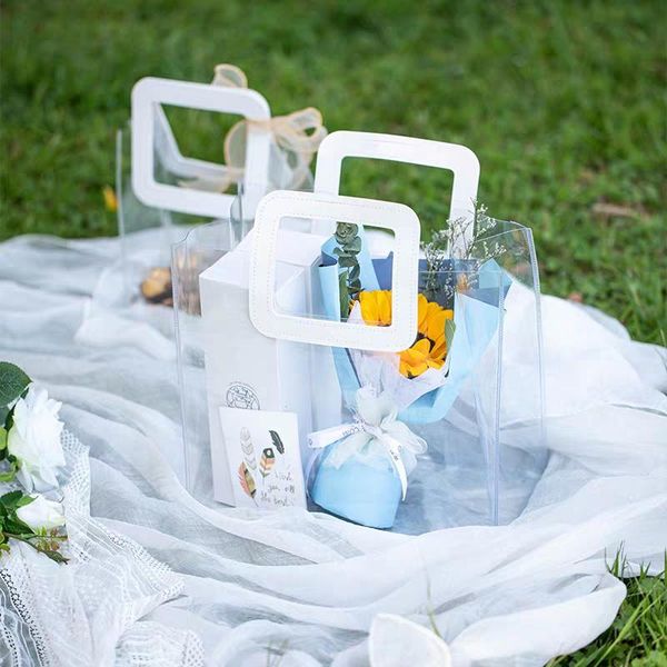 gift wrap 500pcs/ lot custom holographic bags, transparent tote bags hand-carried pvc high-quality plastic packaging bags,custom logo
gift wrap 500pcs/ lot custom holographic bags, transparent tote bags hand-carried pvc high-quality plastic packaging bags,custom logo