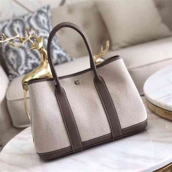 outlet herme 2021 canvas with head women's garden leather contrast single shoulder messenger bag bag l wan
outlet herme 2021 canvas with head women's garden leather contrast single shoulder messenger bag bag l wan
