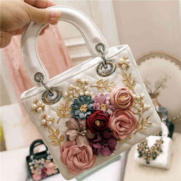 2021 spring fashion women's bag small flower pearl hand-held one shoulder messenger bag diana bag classic versatile
2021 spring fashion women's bag small flower pearl hand-held one shoulder messenger bag diana bag classic versatile