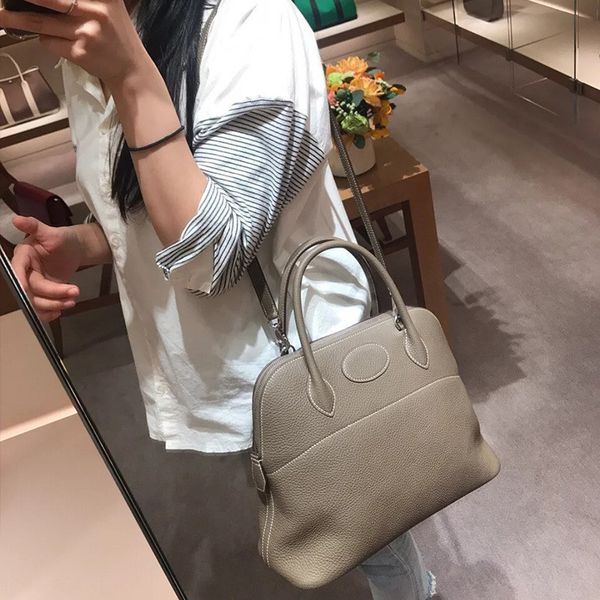 new style bowling bag baolai togo lychee grain head layer cow leather portable one shoulder slanting shell women's bag
new style bowling bag baolai togo lychee grain head layer cow leather portable one shoulder slanting shell women's bag