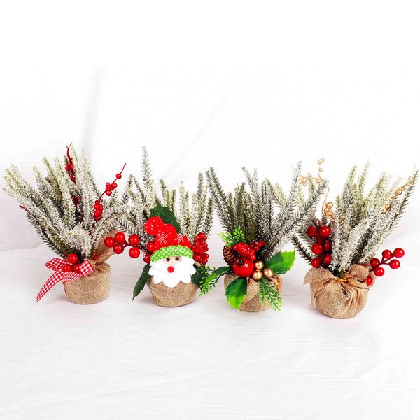 new decorative pine branches and berries ornaments decorate christmas tree in window counter of the activity mall
new decorative pine branches and berries ornaments decorate christmas tree in window counter of the activity mall