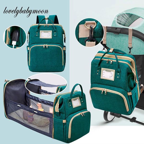 portable crib design mummy bag high capacity waterproof fabric nappy backpack changing pad hooks for maternity baby care diaper bags
portable crib design mummy bag high capacity waterproof fabric nappy backpack changing pad hooks for maternity baby care diaper bags