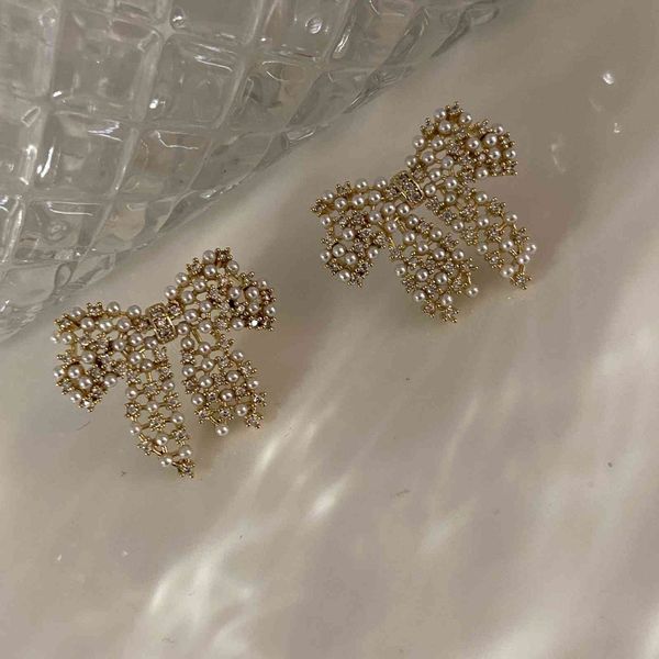 20 pearl bow earrings simple female small temperament atmosphere earrings net red ear jewelry female e15-3, Silver
20 pearl bow earrings simple female small temperament atmosphere earrings net red ear jewelry female e15-3, Silver