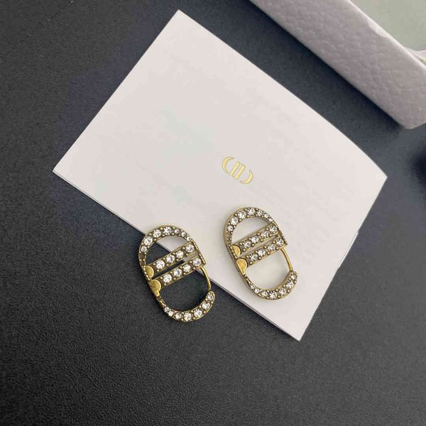 design jewelry letter zircon women's fashion classic brass old versatile personalized earrings, Golden
design jewelry letter zircon women's fashion classic brass old versatile personalized earrings, Golden