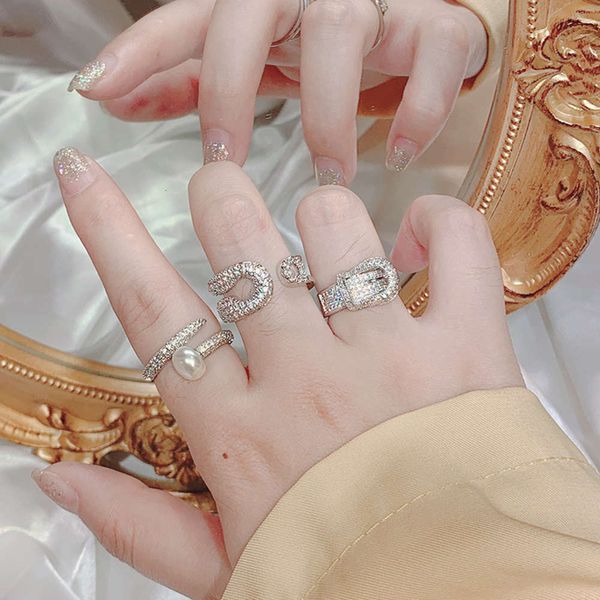 a904 super beauty design belt buckle nail pin personality ring opening adjustable pearl index finger, Black
a904 super beauty design belt buckle nail pin personality ring opening adjustable pearl index finger, Black