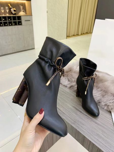fashion boots high heel temperament cowhide real leather black white classic plum blossom heels letter slip on ankle booties size 34-42
fashion boots high heel temperament cowhide real leather black white classic plum blossom heels letter slip on ankle booties size 34-42