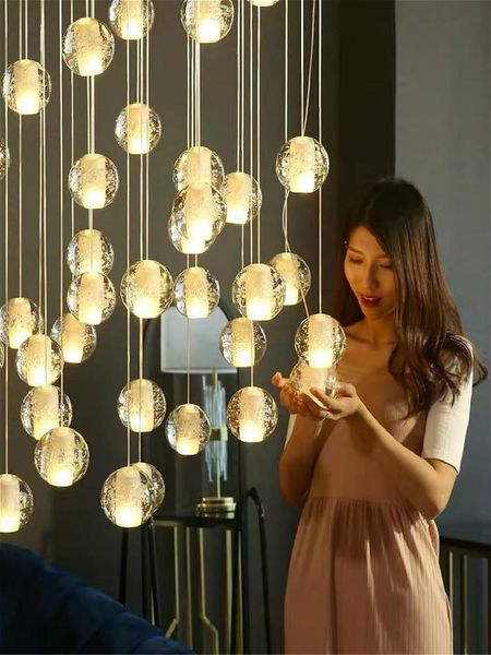 pendant lamps duplex apartment villa staircase light modern round crystal glass ball hanging lamp living room led chandelier
pendant lamps duplex apartment villa staircase light modern round crystal glass ball hanging lamp living room led chandelier