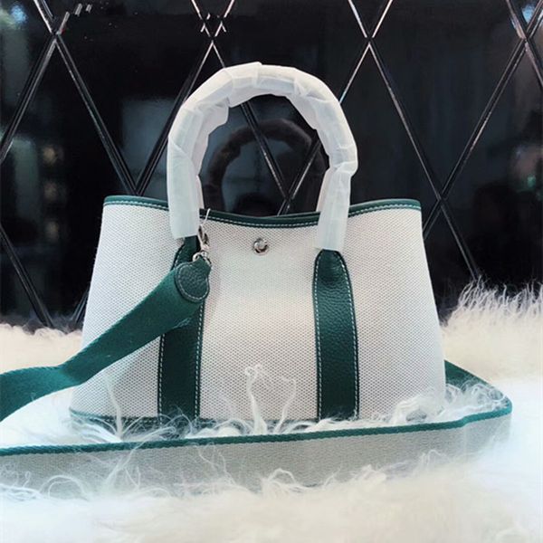 leather women s bag fashion garden bag canvas with leather portable single shoulder messenger bag with canvas shoulder strap
leather women s bag fashion garden bag canvas with leather portable single shoulder messenger bag with canvas shoulder strap