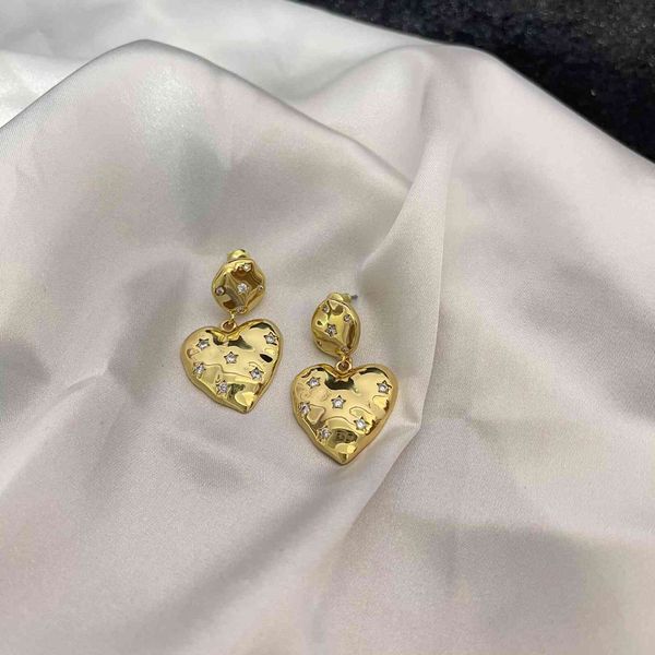 all over the sky star peach heart earrings, minority wind love earrings, exaggerated earrings, Golden
all over the sky star peach heart earrings, minority wind love earrings, exaggerated earrings, Golden