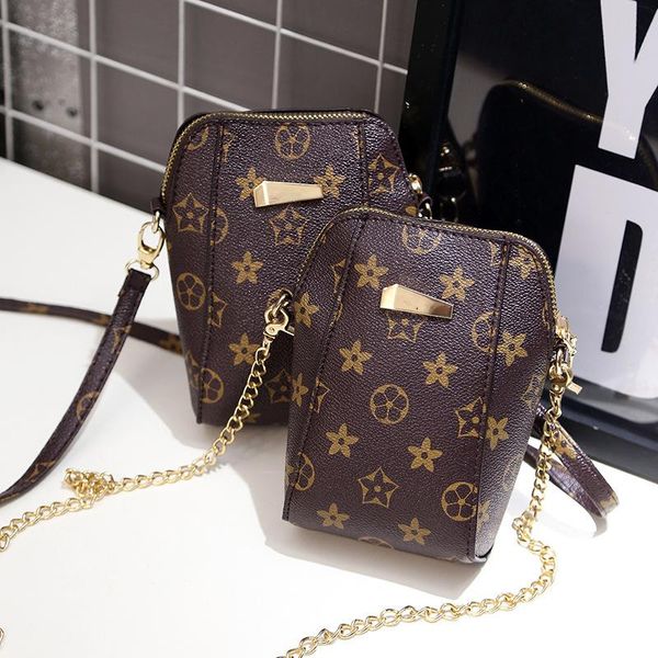cross body 2021 women simple mobile phone bag chain printing lady casual small female luxury designer handbag2021 brand
cross body 2021 women simple mobile phone bag chain printing lady casual small female luxury designer handbag2021 brand
