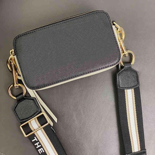 women's bag snapscross-body wide shoulder strap matching color small camera luxury brand high quality
women's bag snapscross-body wide shoulder strap matching color small camera luxury brand high quality