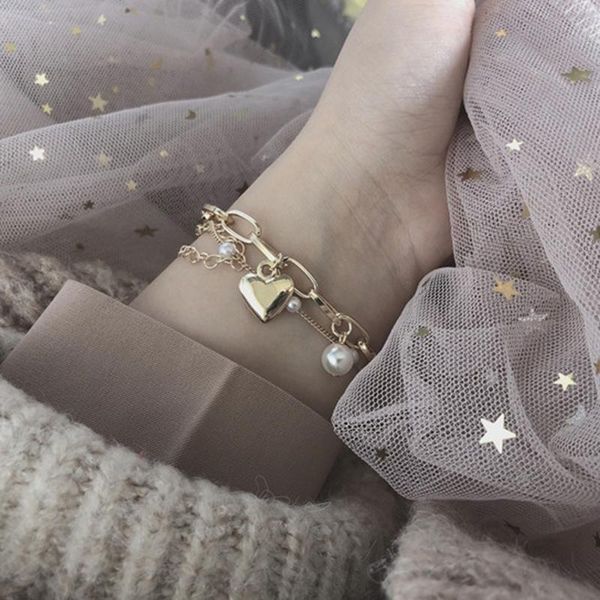 charm bracelets double love pearl bracelet cute and sweet temperament wild metal peach heart pendant female, Golden;silver
charm bracelets double love pearl bracelet cute and sweet temperament wild metal peach heart pendant female, Golden;silver