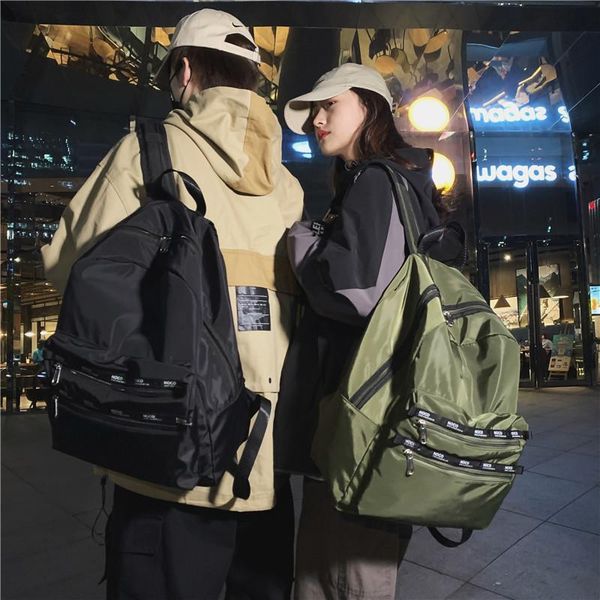 backpack 2021 solid color nylon simple wild female korean version of large-capacity outdoor sports school bag
backpack 2021 solid color nylon simple wild female korean version of large-capacity outdoor sports school bag