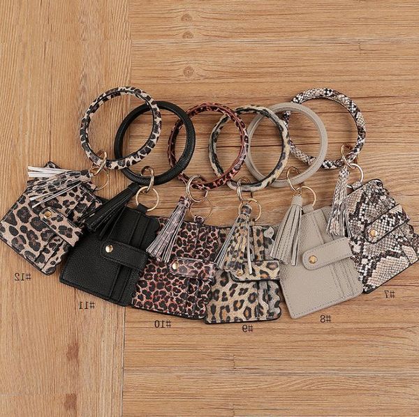 leather bracelet keychain leopard plaid pu tassel wallet wristlet coin purse card bag party favor wholesale
leather bracelet keychain leopard plaid pu tassel wallet wristlet coin purse card bag party favor wholesale