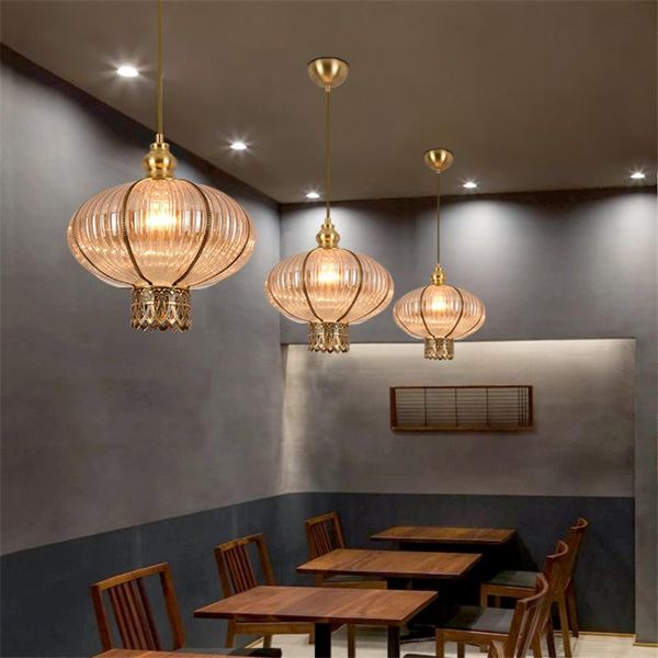 modern copper hollow carved pendant lamps restaurant bar art decoration characteristic glass lights dining room fixture
modern copper hollow carved pendant lamps restaurant bar art decoration characteristic glass lights dining room fixture