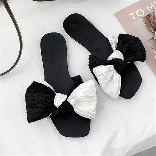 slippers simple bow female 2021 spring fashion wild open toe personality student shoes non-slip, Black
slippers simple bow female 2021 spring fashion wild open toe personality student shoes non-slip, Black