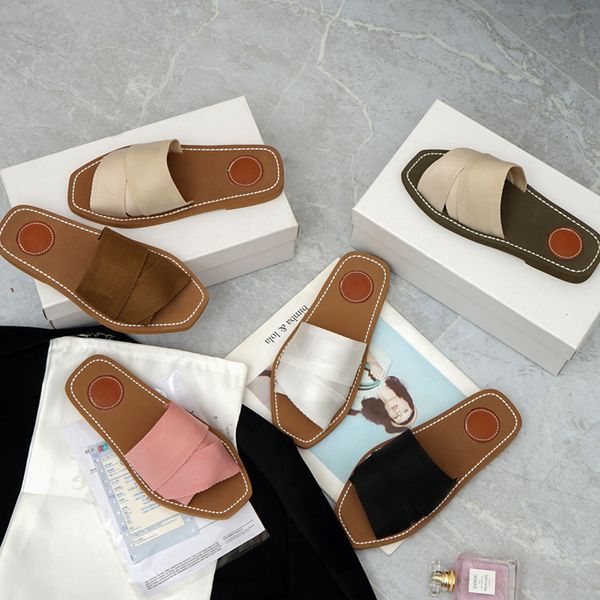 2021 net red summer beach shoes slippers cross bands flats mules sandals chic luxury designer canvas slides women shoe, Black
2021 net red summer beach shoes slippers cross bands flats mules sandals chic luxury designer canvas slides women shoe, Black
