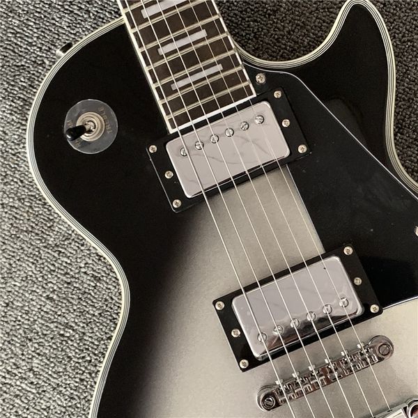 one piece neck one piece body electric guitar in sunburst ,upgrade tune-o-matic bridge guitar tiger flame guitar smoke colour
one piece neck one piece body electric guitar in sunburst ,upgrade tune-o-matic bridge guitar tiger flame guitar smoke colour