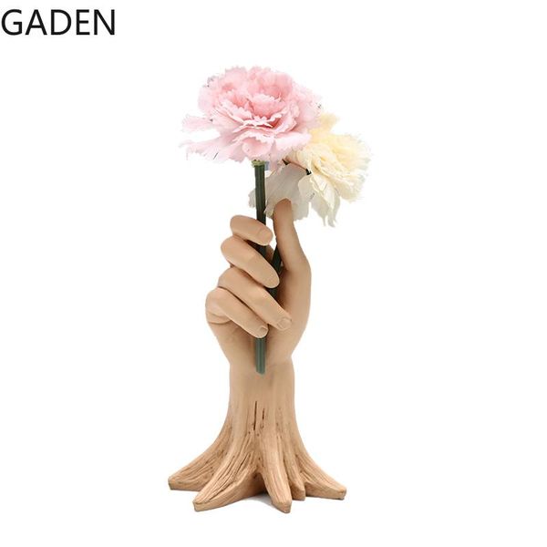 vases nordic handmade resin vase creative hand holding flowers ornaments dried flower accessories home crafts living room decorations
vases nordic handmade resin vase creative hand holding flowers ornaments dried flower accessories home crafts living room decorations