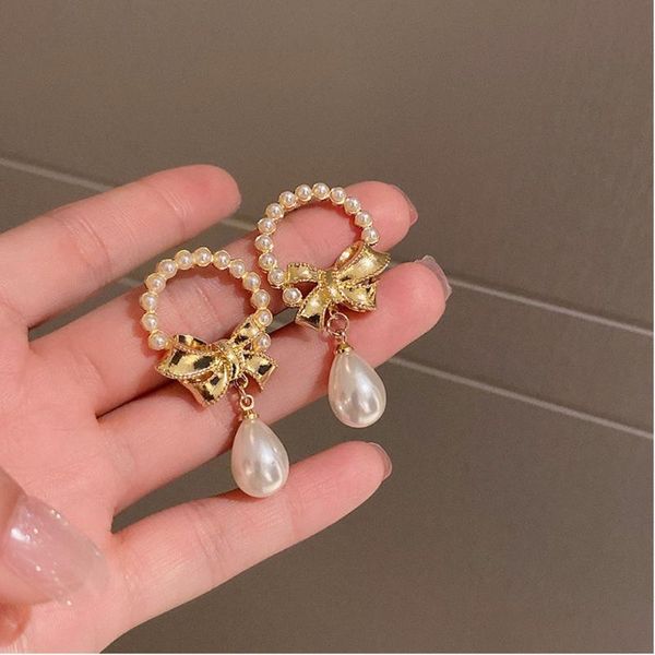 dangle & chandelier fashion simple pearl bow earrings retro gentle temperament female, Silver
dangle & chandelier fashion simple pearl bow earrings retro gentle temperament female, Silver
